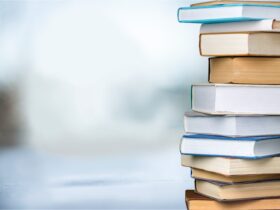 A stack of books piled on top of each other